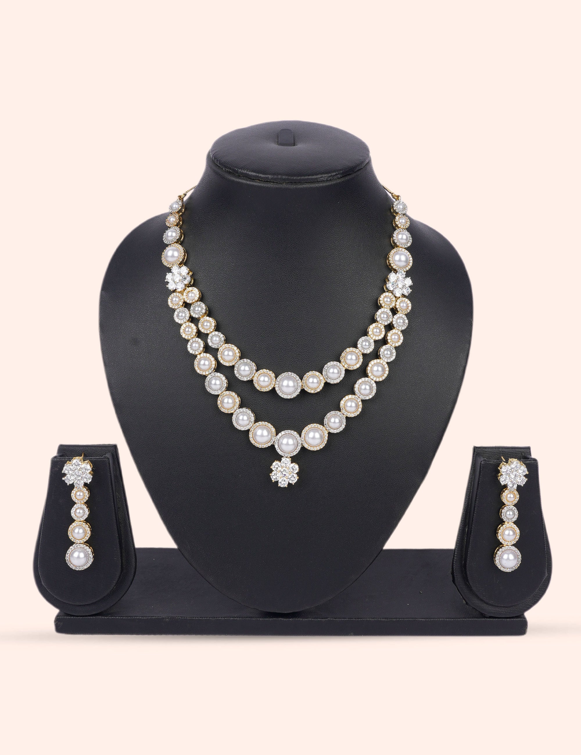 Crown Jewel Pearls & Zirconia Diamond Statement Set by N Dazzles Designs (the rings are golden and silver)